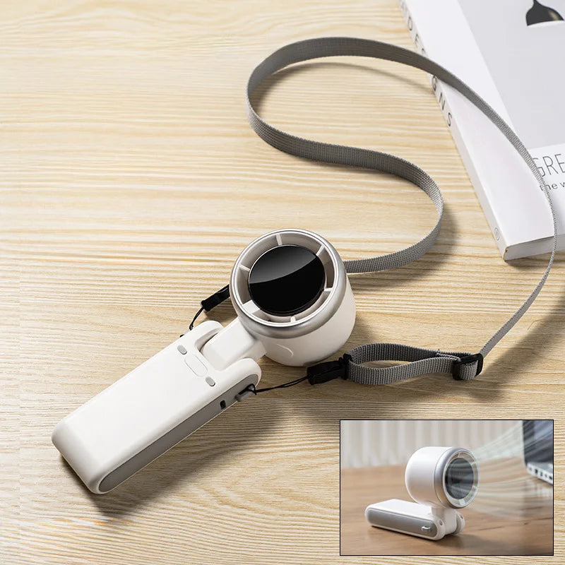Compact and Powerful: 2024 Mini Handheld Turbo Fan - Perfect for Students and Outdoor Adventures!